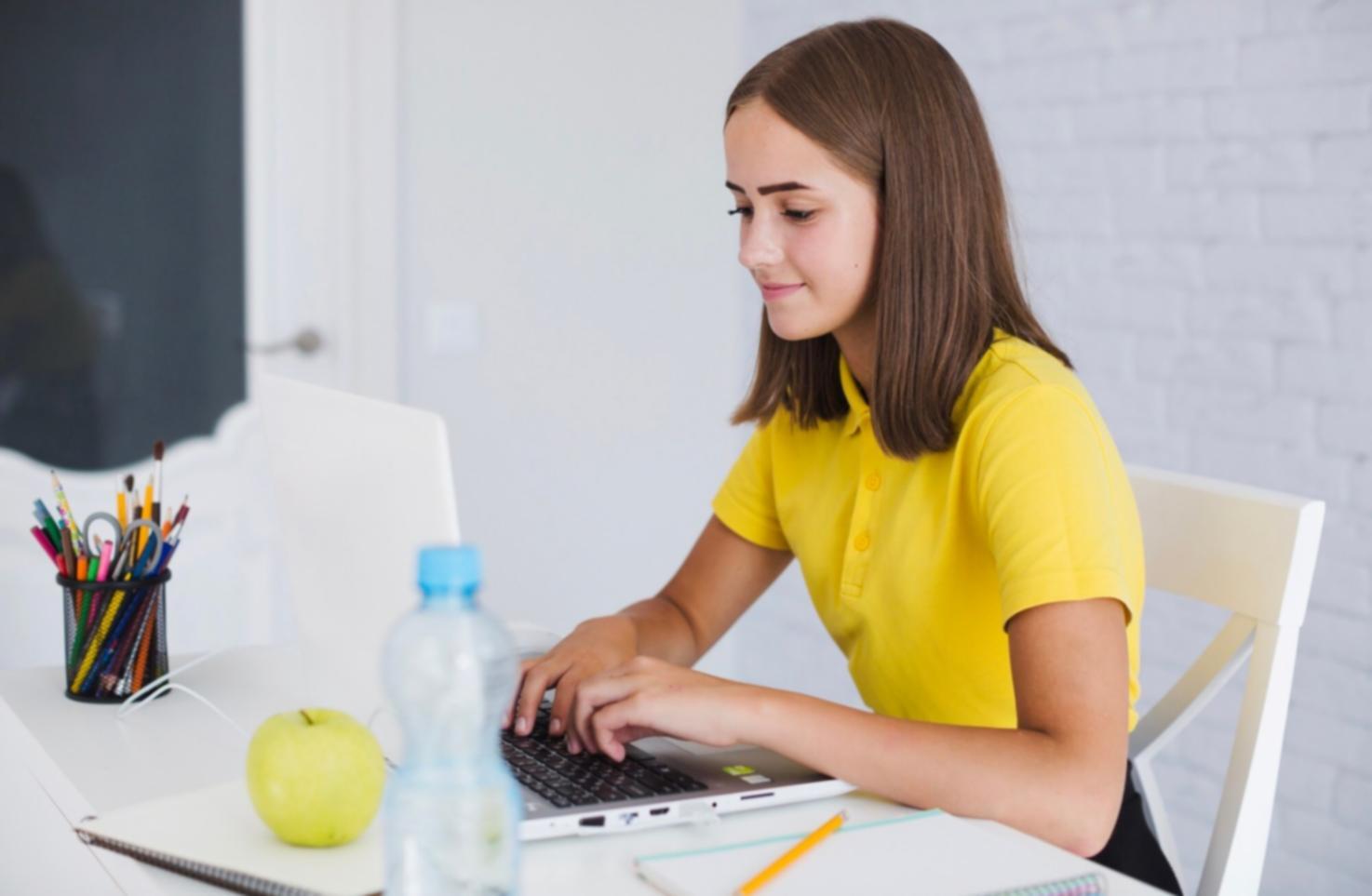 Software testing team reviewing application functionality on multiple devices